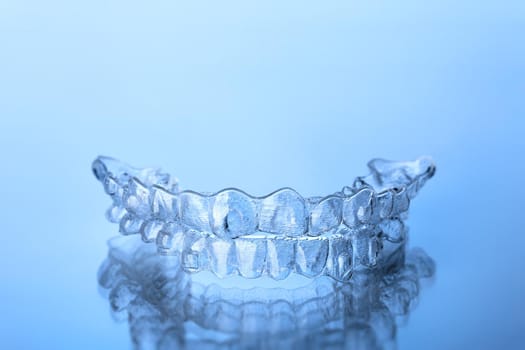 Invisible dental teeth bracket tooth aligners. Invisalign braces. Invisible aligner - Orthodontic temporary removable straighteners.