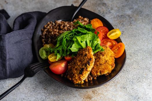 Healthy vegetable and meat cutlet cowl with raw and fresh  ingredients