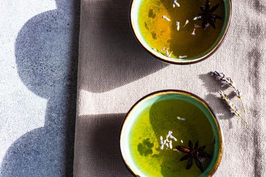 Summer green tea drink with lavender flowers