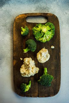 Healthy raw food concept with slice of cauliflower in the bowl