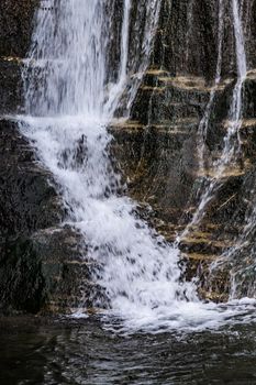 Waterfall in wild area close to georgian capital city Tbilisi in early sping season