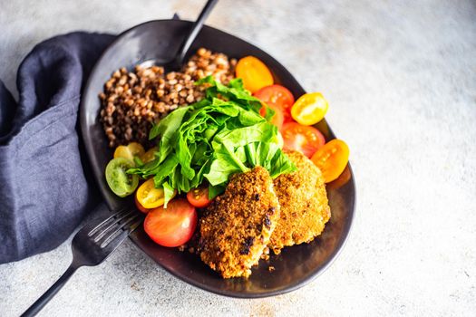 Healthy vegetable and meat cutlet cowl with raw and fresh  ingredients