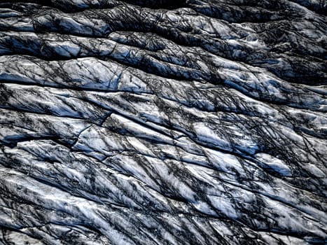 Aerial view of glacier from above, ice texture landscape, beautiful nature blue background from Iceland