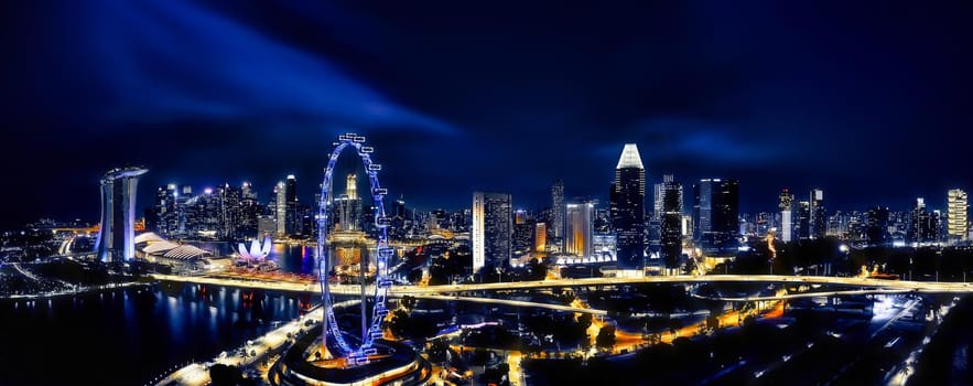 Beautiful view of Singapore night. Skyscrapers at the Marina Bay. Panorama of the sights of Singapore.