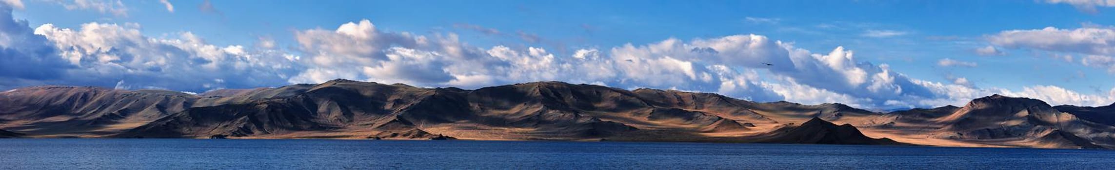 Panorama of a mountain lake. Somewhere in the vastness of Mongolia.