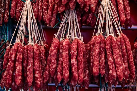 Street trade in Chinatown. Smoked Chinese red sausages.