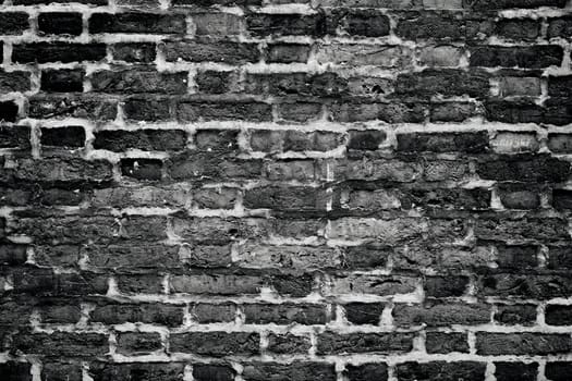 Old brick wall. Horizontal wide brick wall background. Vintage house facade