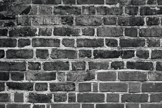 Old brick wall. Horizontal wide brick wall background. Vintage house facade