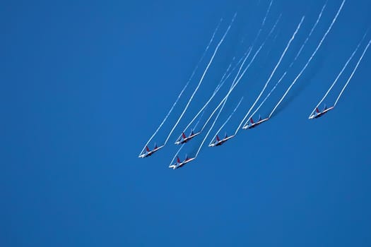 Airshow of the aerobatic team Strizhi (The Swifts). Aerobatic Team on fighters Mig-29, Russian Air Force, on at the International Aviation and Space salon MAKS 2019. ZHUKOVSKY, RUSSIA, 08,27,2019.