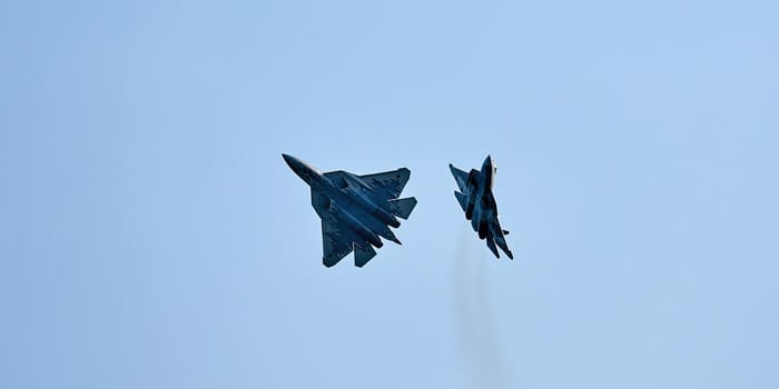 New Russian five generation's fighters SU 57 (T-50) shows aerial maneuver battle at Moscow International Aviation and Space Salon MAKS 2019. RUSSIA, AUGUST 28, 2019.