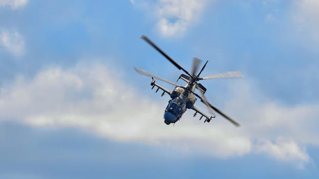 Kamov Ka-52 Alligator (NATO code name: Hokum B). Attack helicopter performing demonstration flight on MAKS 2019 airshow. ZHUKOVSKY, RUSSIA, AUGUST 27, 2019.