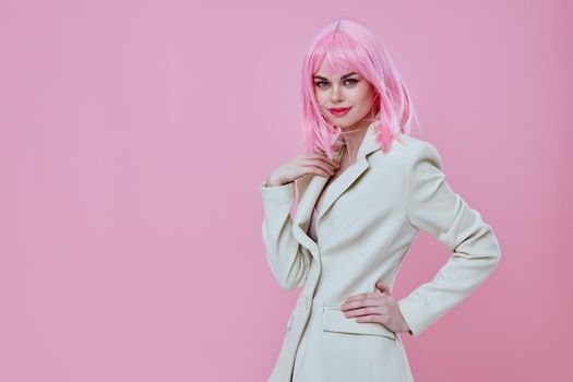 Beautiful fashionable girl attractive look white blazer pink wig studio model unaltered. High quality photo