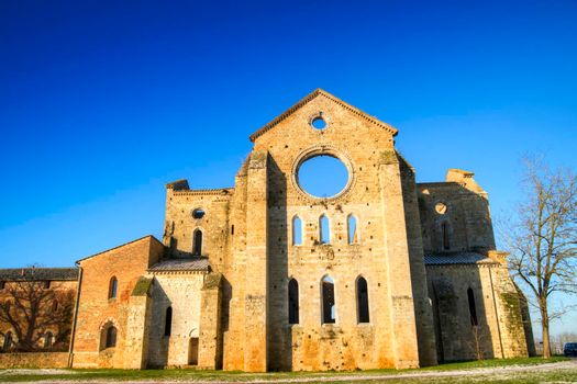 Photo shoot of the famous roofless church of San Galgano in the lands near Siena Italy 