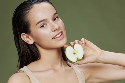 beautiful woman apple in hands posing fruit healthy food fresh isolated background. High quality photo