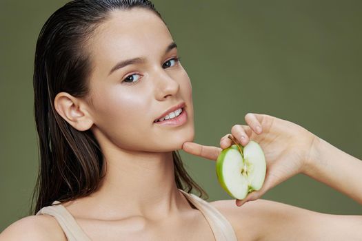 young woman apple in hands posing fruit healthy food fresh isolated background. High quality photo