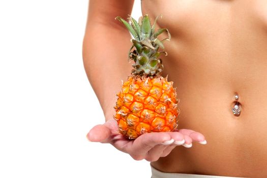 Beautiful female belly and pineapple on white background