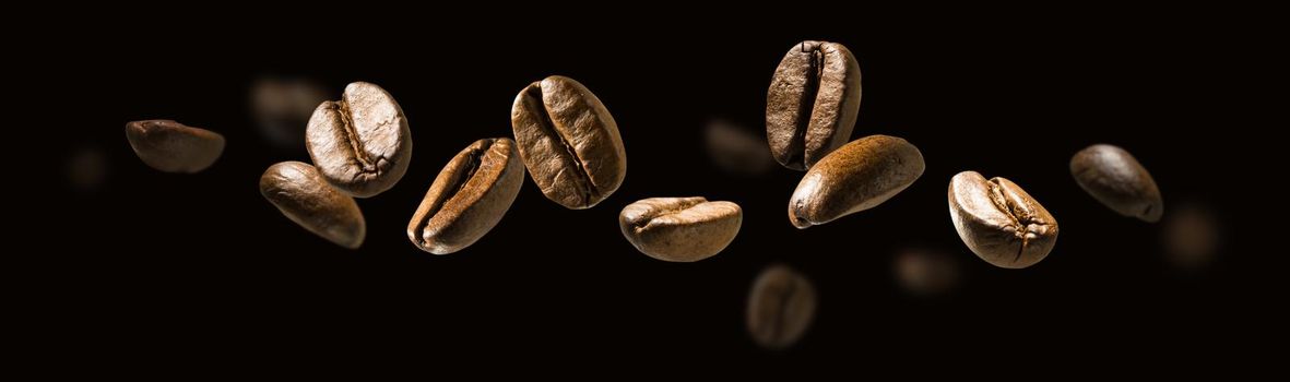 Coffee beans in flight on a dark background.