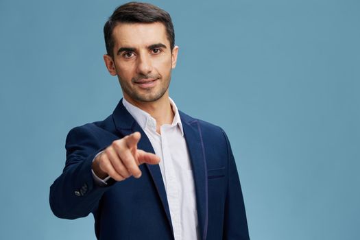 businessmen hand gesture pointing forward business process Quiet confidence blue background. High quality photo