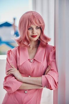 glamorous woman in a pink dress outdoors nature view Summer day. High quality photo