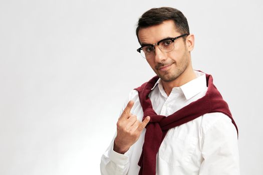 handsome businessman with glasses self confidence posing emotions elegant style. High quality photo