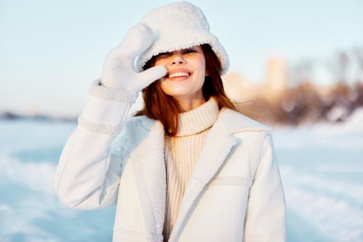 beautiful woman winter weather snow posing nature rest Lifestyle. High quality photo
