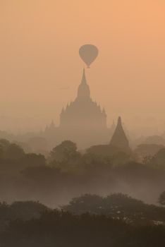 hot air balloon with pagoda in bagan