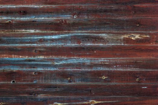 A texture of old painted wooden horizontall plank fence