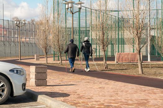 people engaged in recreational walking in the park. high quality photo