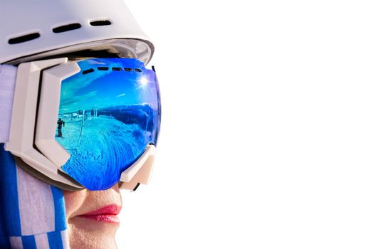 Portrait of woman in alps. woman in ski goggles at the ski resort. woman in mountain goggles. reflection in ski goggles