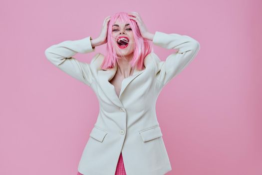 Pretty young female attractive look white blazer pink wig color background unaltered. High quality photo