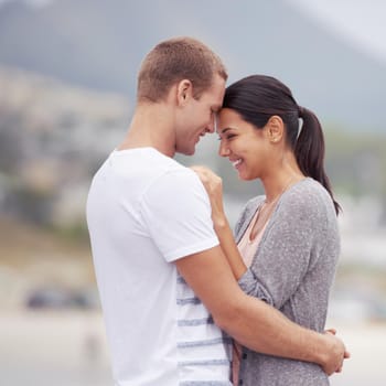 Shot of an affectionate young couple at the beach.