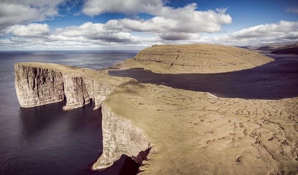 Vintage view of Sorvagsvatn lake above the ocean in Vagar island, Faroe Islands