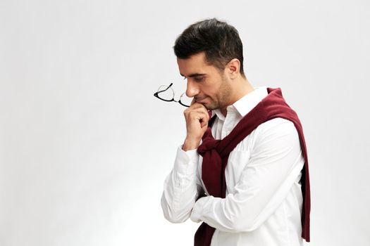 successful man with glasses self confidence posing emotions business and office concept. High quality photo