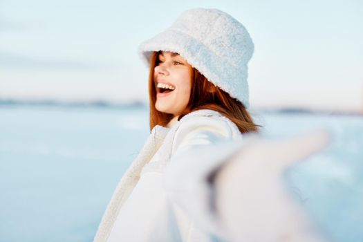 woman winter clothes walk snow cold vacation Fresh air. High quality photo