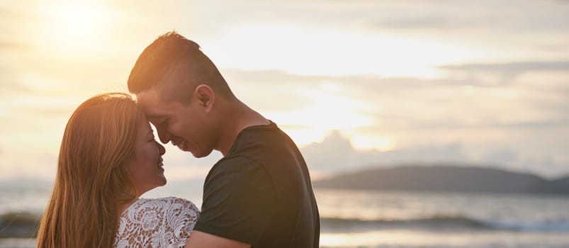 Cropped shot of a young couple sharing an intimate moment.