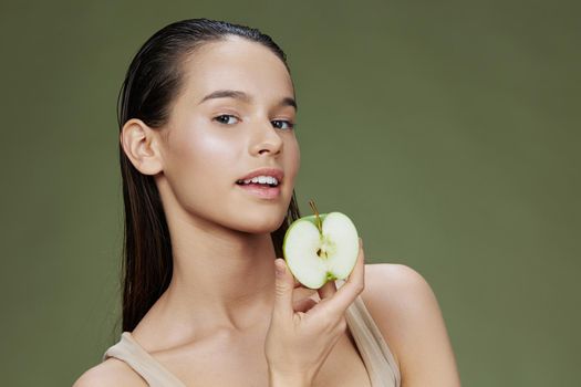 woman apple in hands posing fruit healthy food fresh close-up Lifestyle. High quality photo