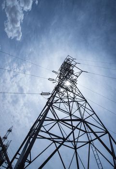 Tall Electric Tower with Lines and Blue Sky