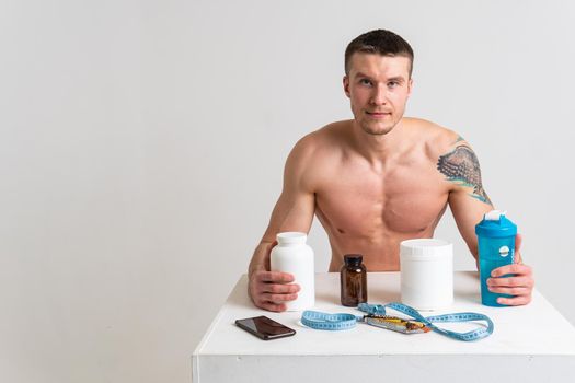 Fitness protein jars white on white background bodybuilder powder strong high