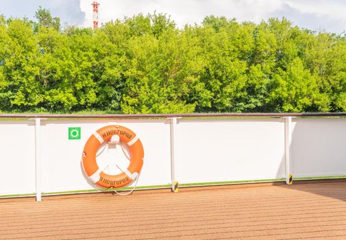 Lifebuoy on the deck of the ship sailing summer relaxing, vacation beautiful tourism sport bahamas. Cruise cabin, journey tourists seascape cruise liner lifeboat lower deck drone