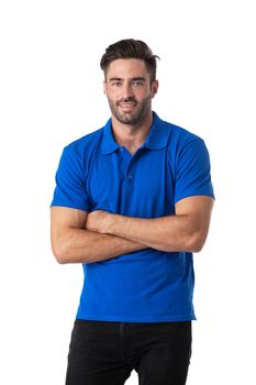 Happy casual man smiling and holding his hand crossed at his chest, standing isolated on white studio background
