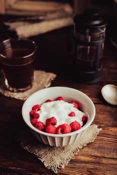 Dessert with Fresh Raspberry and Sour Cream in Bowl and Glass of Coffee