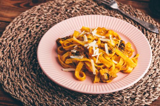 Portion of Pumpkin Pasta with Sour Cream and Mushrooms