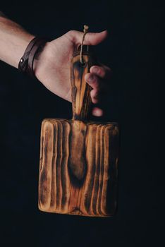 Small Handcrafted Cutting Board in Carpenter Hand