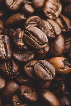 Background of fresh roasted coffee beans. Selective focus