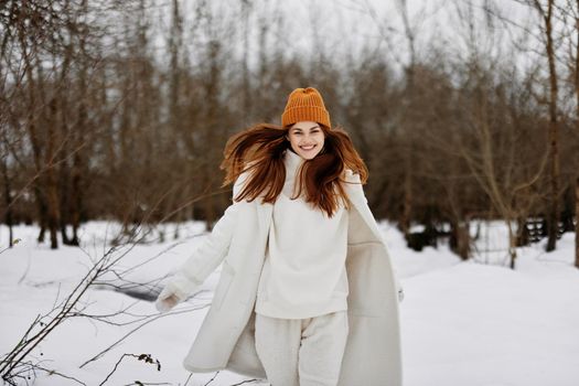 cheerful woman red hair walk in the fresh winter air Lifestyle. High quality photo