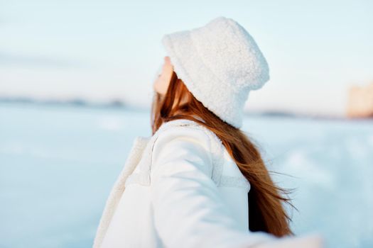 young woman winter clothes walk snow cold vacation travel. High quality photo