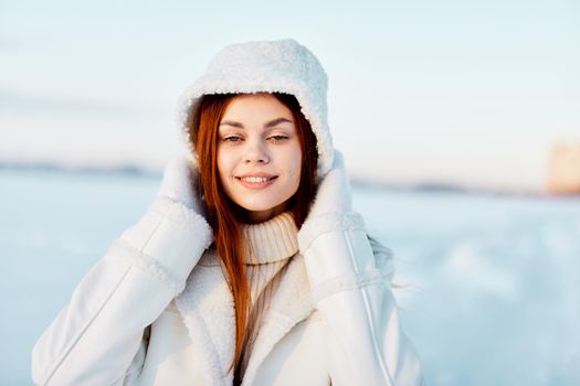 young woman winter weather snow posing nature rest Lifestyle. High quality photo