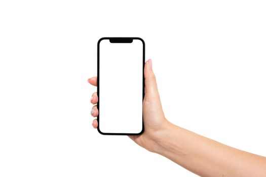 Woman hand holding smartphone with blank screen isolated on white background. Phone mockup. High quality photo