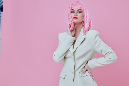 Pretty young female in White blazer pink hair Glamor Cosmetics color background unaltered. High quality photo