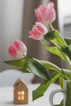 spring still life with fresh pink tulips, home decor